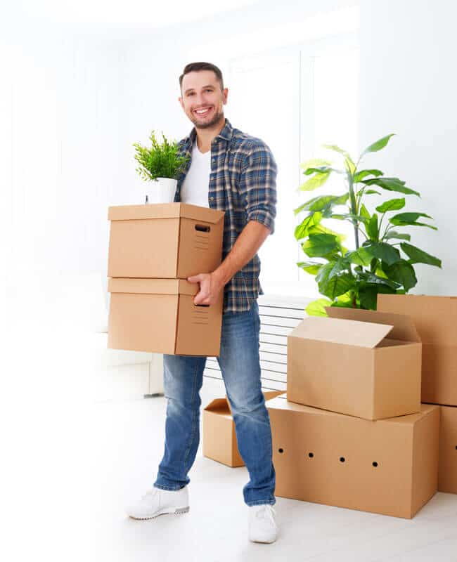 46637395-moving-to-a-new-apartment-young-happy-man-with-cardboard-boxes